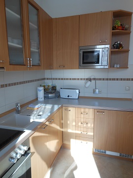 Einbaukueche in Kirschbaum-Furnier